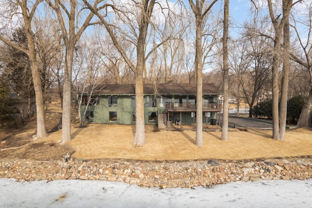 view of front of home featuring a deck and stairs