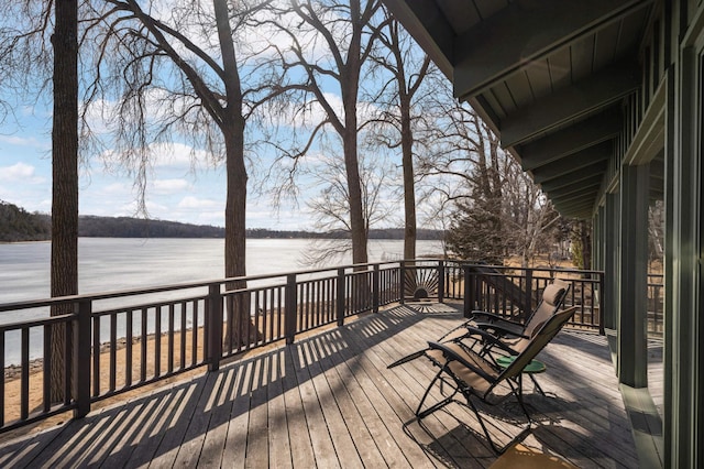 deck featuring a water view