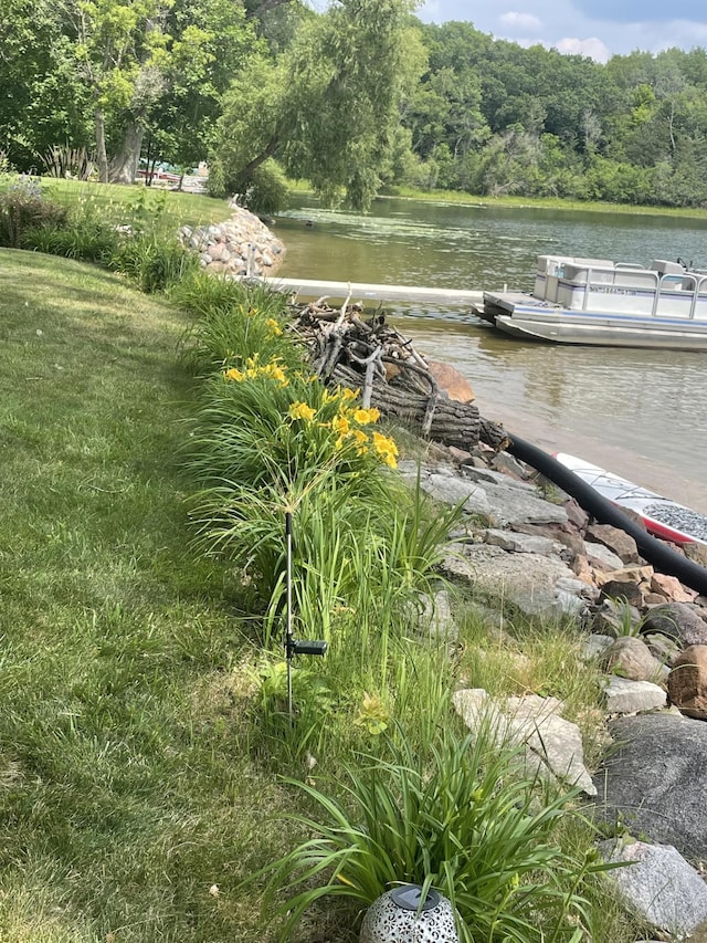 dock area featuring a water view