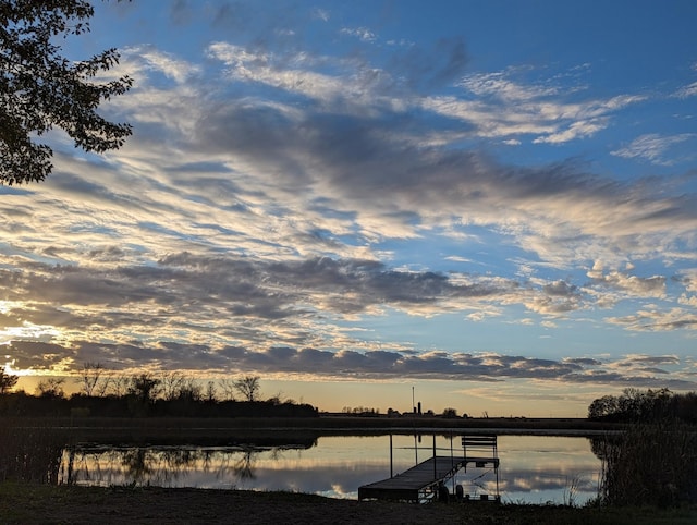 property view of water featuring a boat dock