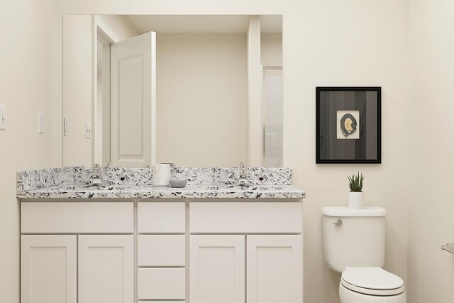 416 Tanner Dr, Waverly, MN 55390 - bathroom featuring a sink, double vanity, and toilet
