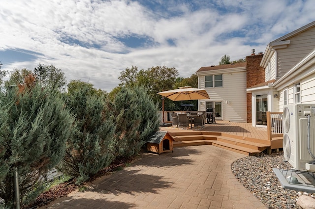 exterior space featuring ac unit and outdoor dining space