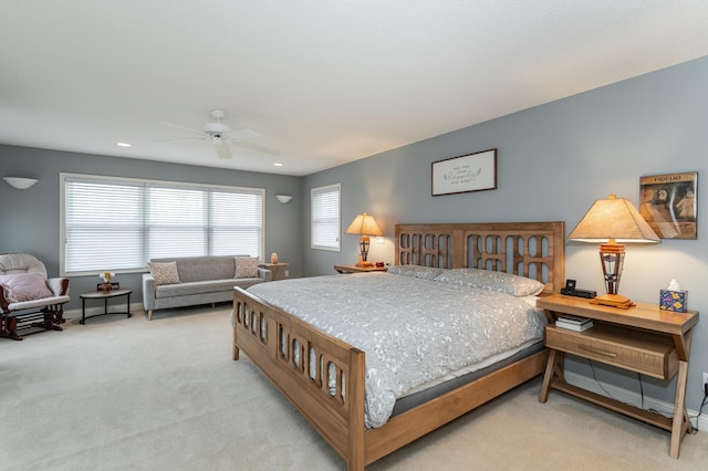 carpeted bedroom with a ceiling fan, recessed lighting, and baseboards