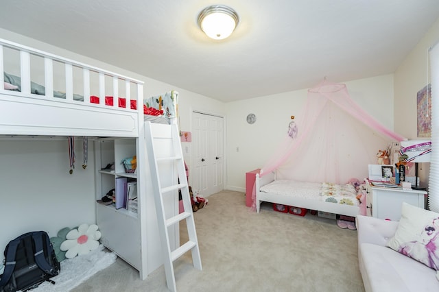 bedroom with light colored carpet