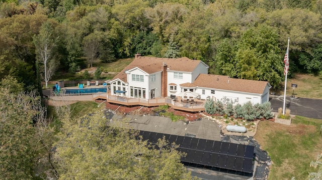 bird's eye view with a view of trees