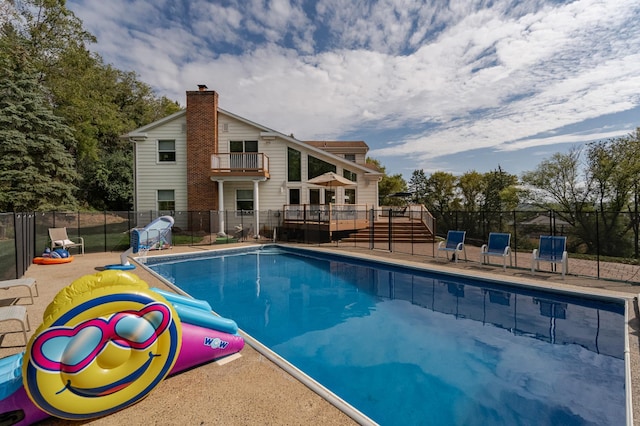 view of pool with a patio, fence, and a fenced in pool