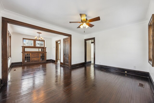 unfurnished living room featuring ornamental molding, baseboards, visible vents, and hardwood / wood-style floors