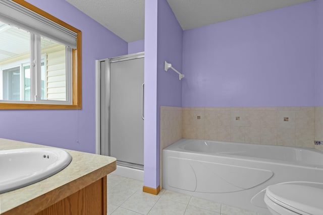 bathroom with a textured ceiling, a garden tub, tile patterned flooring, toilet, and a shower stall