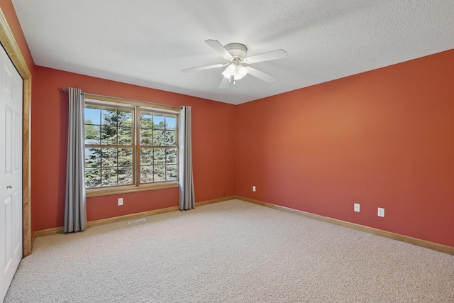 1615 Quasar Ct S, Lake Saint Croix Beach, MN 55043 - carpeted spare room with ceiling fan and baseboards