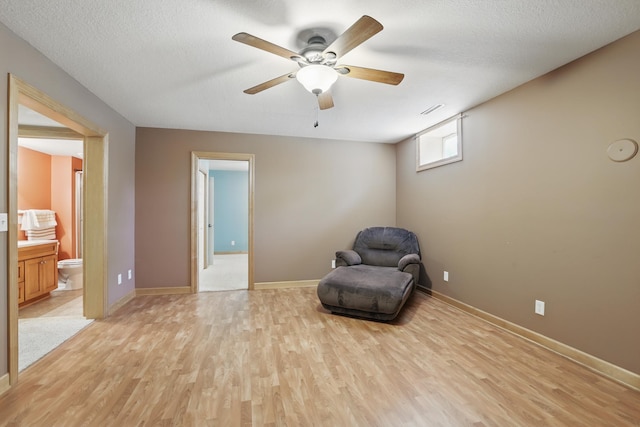 1615 Quasar Ct S, Lake Saint Croix Beach, MN 55043 - unfurnished room with light wood-type flooring, a ceiling fan, and baseboards