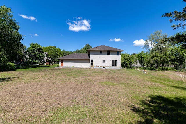 1615 Quasar Ct S, Lake Saint Croix Beach, MN 55043 - back of property featuring a lawn