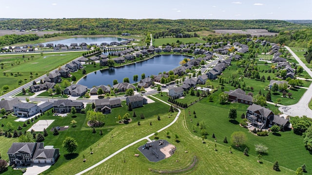 aerial view with a residential view and a water view