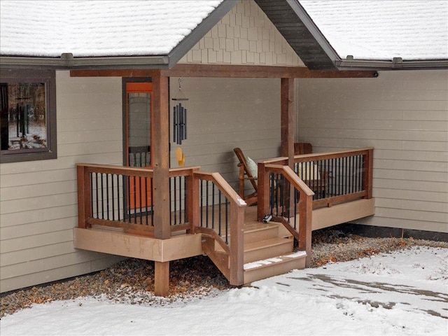 view of snow covered deck