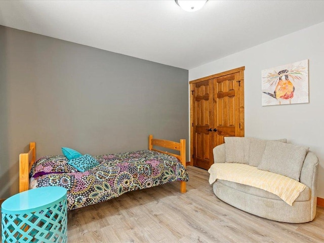 bedroom featuring wood finished floors