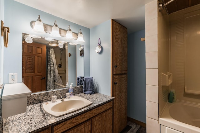 full bathroom featuring shower / tub combo with curtain and vanity