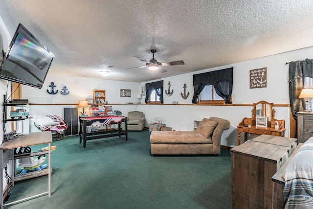 living area with carpet flooring, ceiling fan, and a textured ceiling