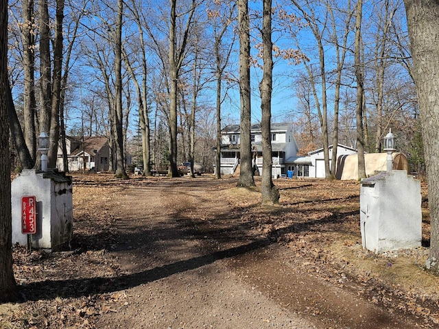 view of road with driveway