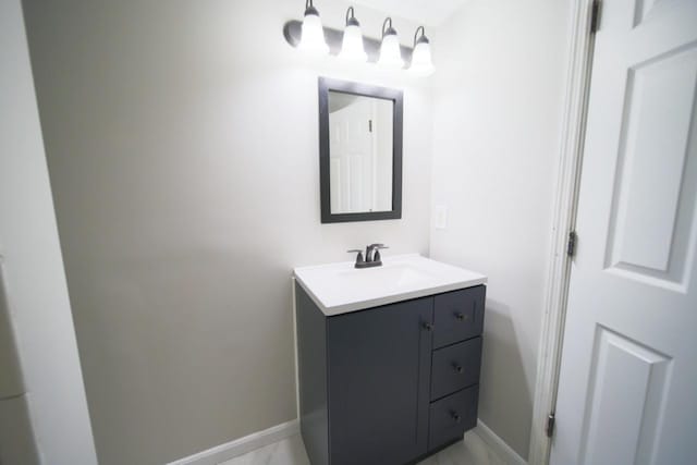 690 Western Ave N, Saint Paul, MN 55103 - bathroom with vanity and marble finish flooring