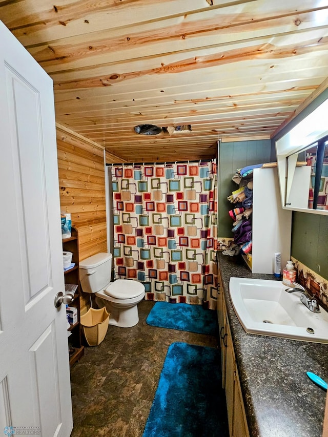 full bath with wooden walls, curtained shower, toilet, wooden ceiling, and vanity