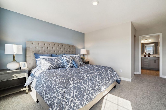 carpeted bedroom with baseboards