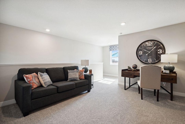 carpeted living room with recessed lighting and baseboards