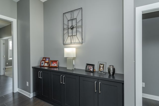 details with baseboards and wood finished floors