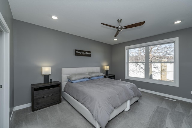 carpeted bedroom featuring recessed lighting, a ceiling fan, and baseboards