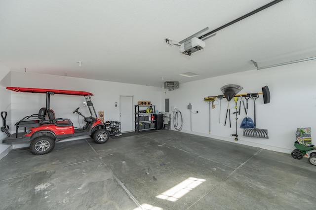 garage featuring a garage door opener