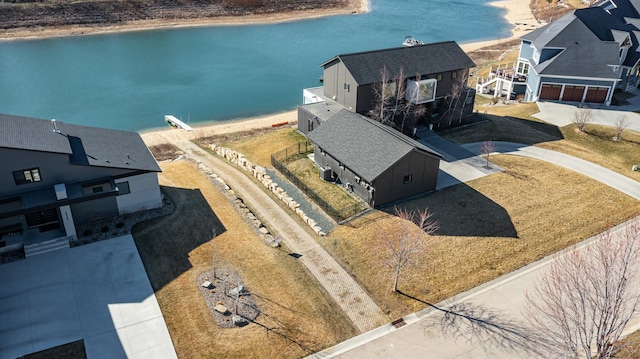 drone / aerial view featuring a water view