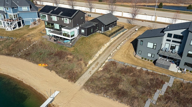 birds eye view of property with a residential view