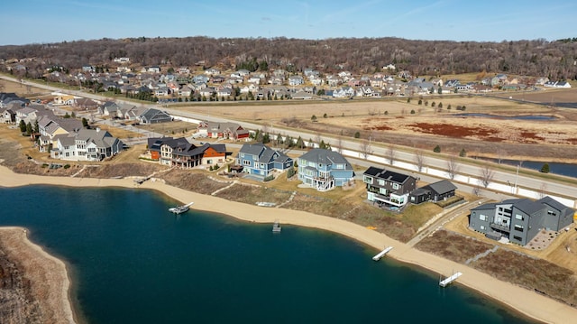 aerial view with a residential view and a water view