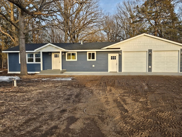 9806 County Road 144, Brainerd, MN 56401 - ranch-style house featuring a shingled roof and an attached garage