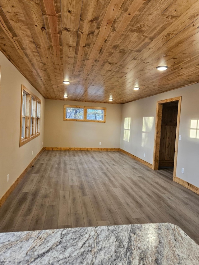 9806 County Road 144, Brainerd, MN 56401 - unfurnished room featuring wooden ceiling, wood finished floors, and baseboards