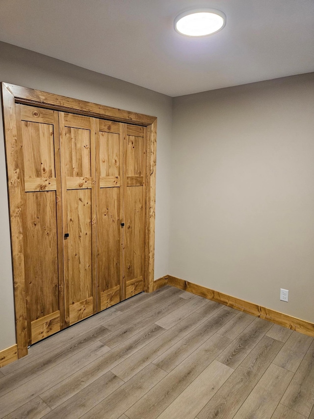 9806 County Road 144, Brainerd, MN 56401 - unfurnished bedroom with light wood-type flooring and baseboards