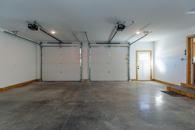 9806 County Road 144, Brainerd, MN 56401 - garage featuring baseboards and a garage door opener