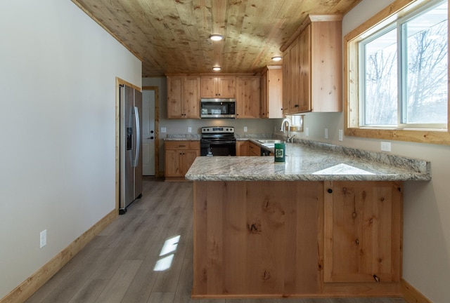 9806 County Road 144, Brainerd, MN 56401 - kitchen featuring a peninsula, light wood-style floors, stainless steel appliances, wood ceiling, and a sink