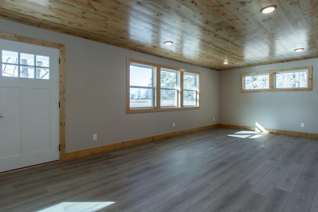 9806 County Road 144, Brainerd, MN 56401 - entrance foyer with baseboards, wooden ceiling, and wood finished floors