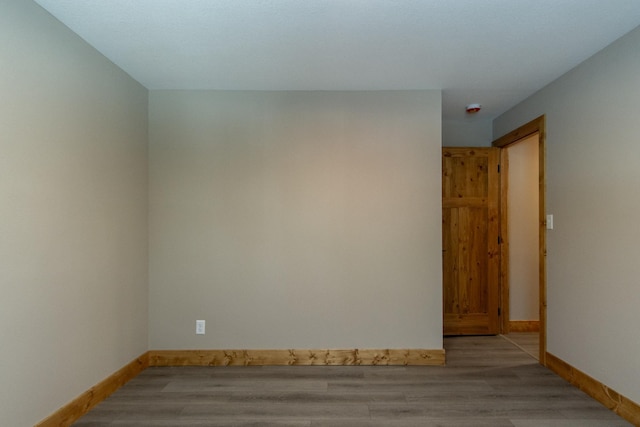 9806 County Road 144, Brainerd, MN 56401 - unfurnished room featuring light wood-style floors and baseboards