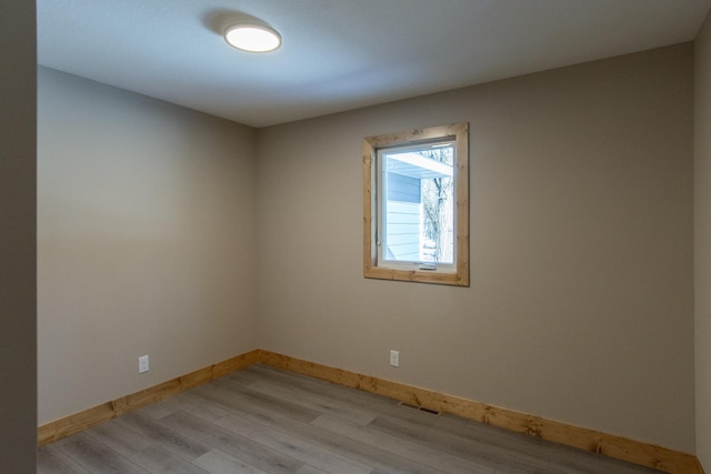 9806 County Road 144, Brainerd, MN 56401 - unfurnished room featuring light wood-style flooring, baseboards, and visible vents