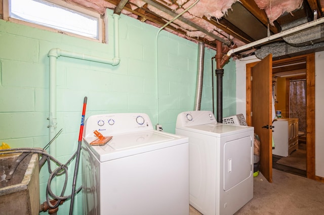 laundry room featuring laundry area and washer and clothes dryer