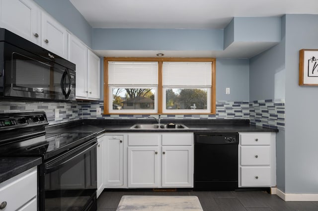 kitchen featuring black appliances, tasteful backsplash, a sink, and white cabinets