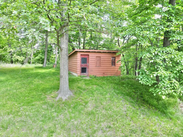 34257 Dusty Trl, Frazee, MN 56544 - view of green lawn featuring an outdoor structure