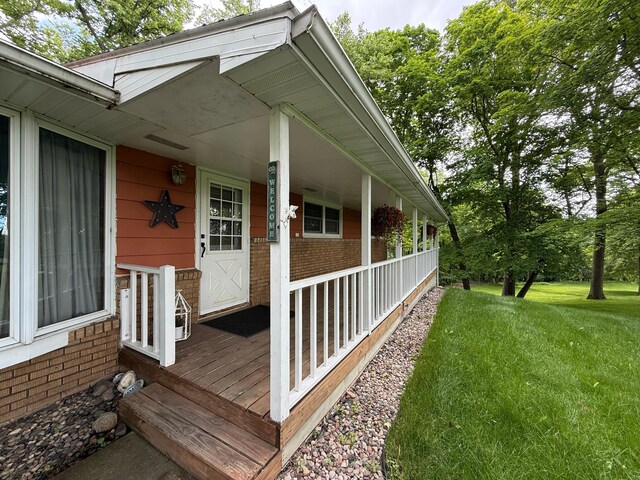 34257 Dusty Trl, Frazee, MN 56544 - porch featuring a yard