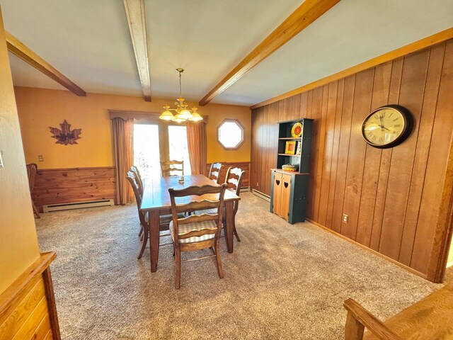 34257 Dusty Trl, Frazee, MN 56544 - dining space with a baseboard heating unit, wooden walls, a chandelier, carpet, and beam ceiling