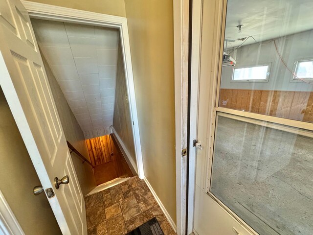 34257 Dusty Trl, Frazee, MN 56544 - stairs featuring stone finish flooring and wooden walls