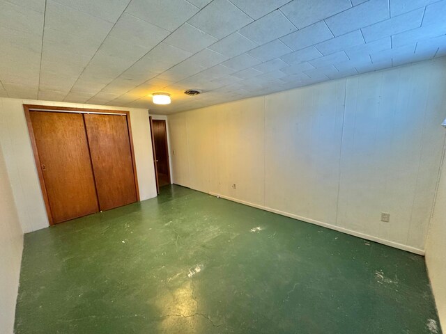 34257 Dusty Trl, Frazee, MN 56544 - unfurnished bedroom with a closet and concrete floors