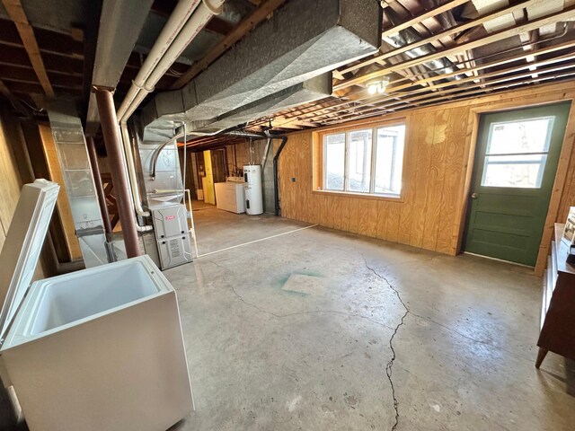 34257 Dusty Trl, Frazee, MN 56544 - basement featuring water heater and healthy amount of natural light