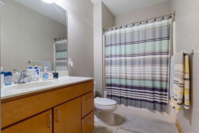 bathroom with shower / bath combination with curtain, vanity, toilet, and tile patterned floors