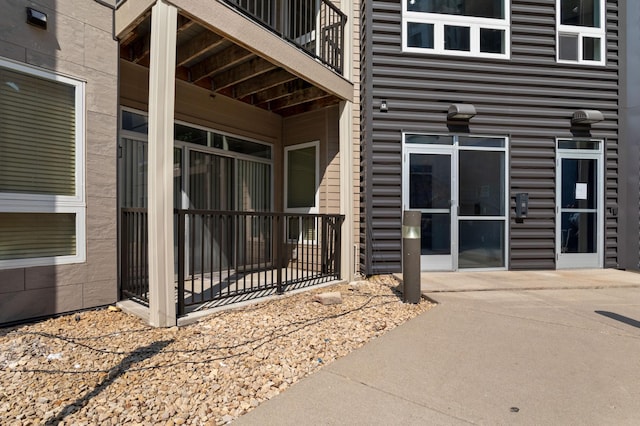 doorway to property featuring a balcony