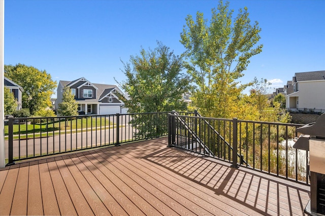 wooden terrace with a residential view